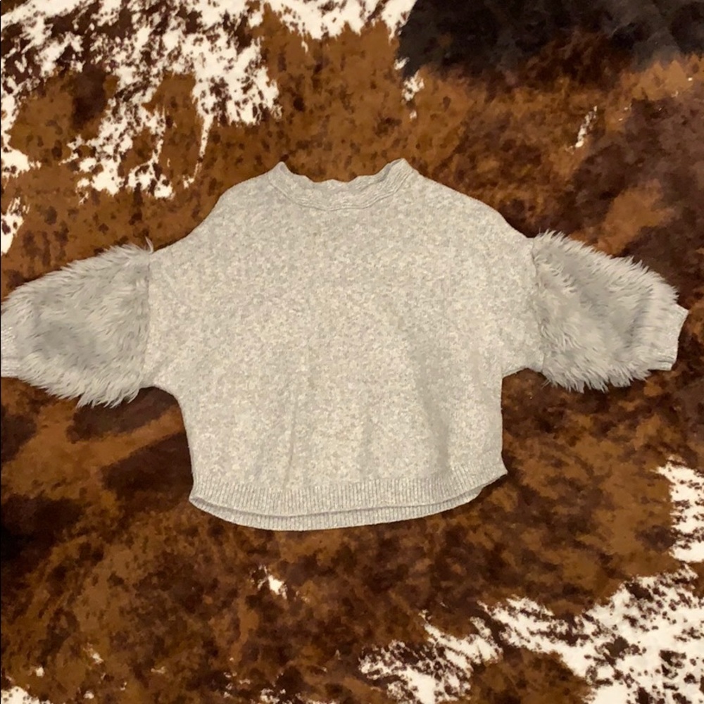 Grey sweater with fur sleeves